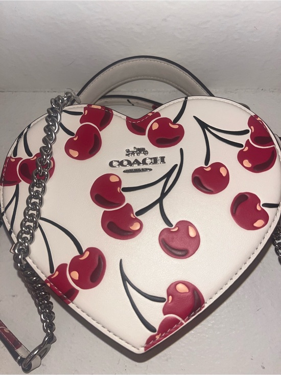 Coach Handbags - Coach White Heart-Shaped Crossbody with Red Cherry Print